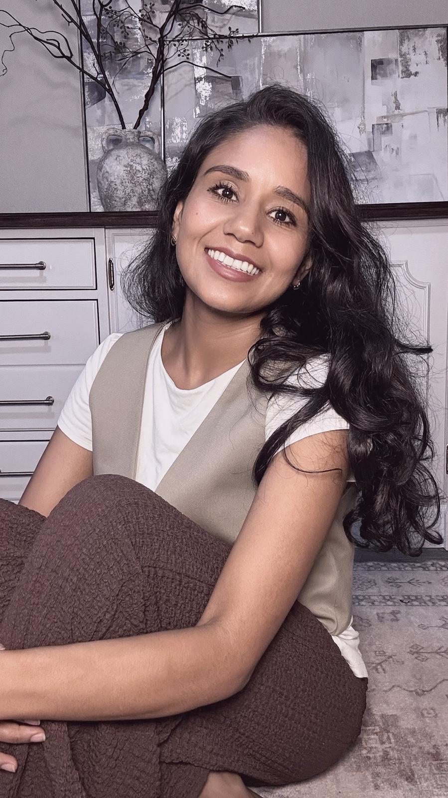 Ligia Romero, founder of Bloom & Curate Organize, at home.